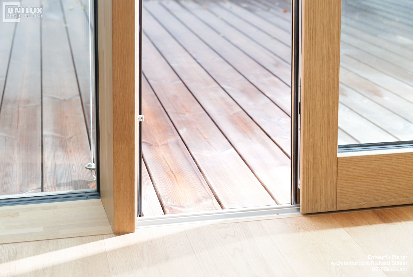 Unilux Lift and Slide Aluminium Wood Sliding Door, 32mm Glass, 8mm frame, High Security Multi-point locking system.